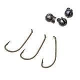 Three bronze fishing hooks and three small round sinkers arranged on white background