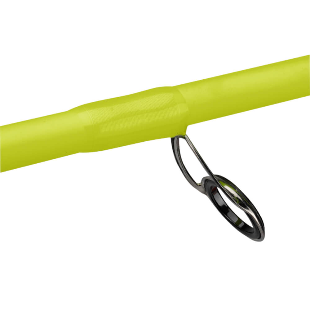 Neon chartreuse spinning-rod blank section showing a stainless-steel guide ring with ceramic insert