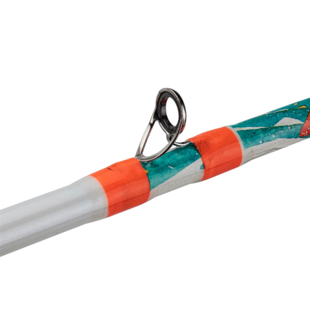 Krazy Recreational spincast rod guide with orange thread wraps on teal patterned blank