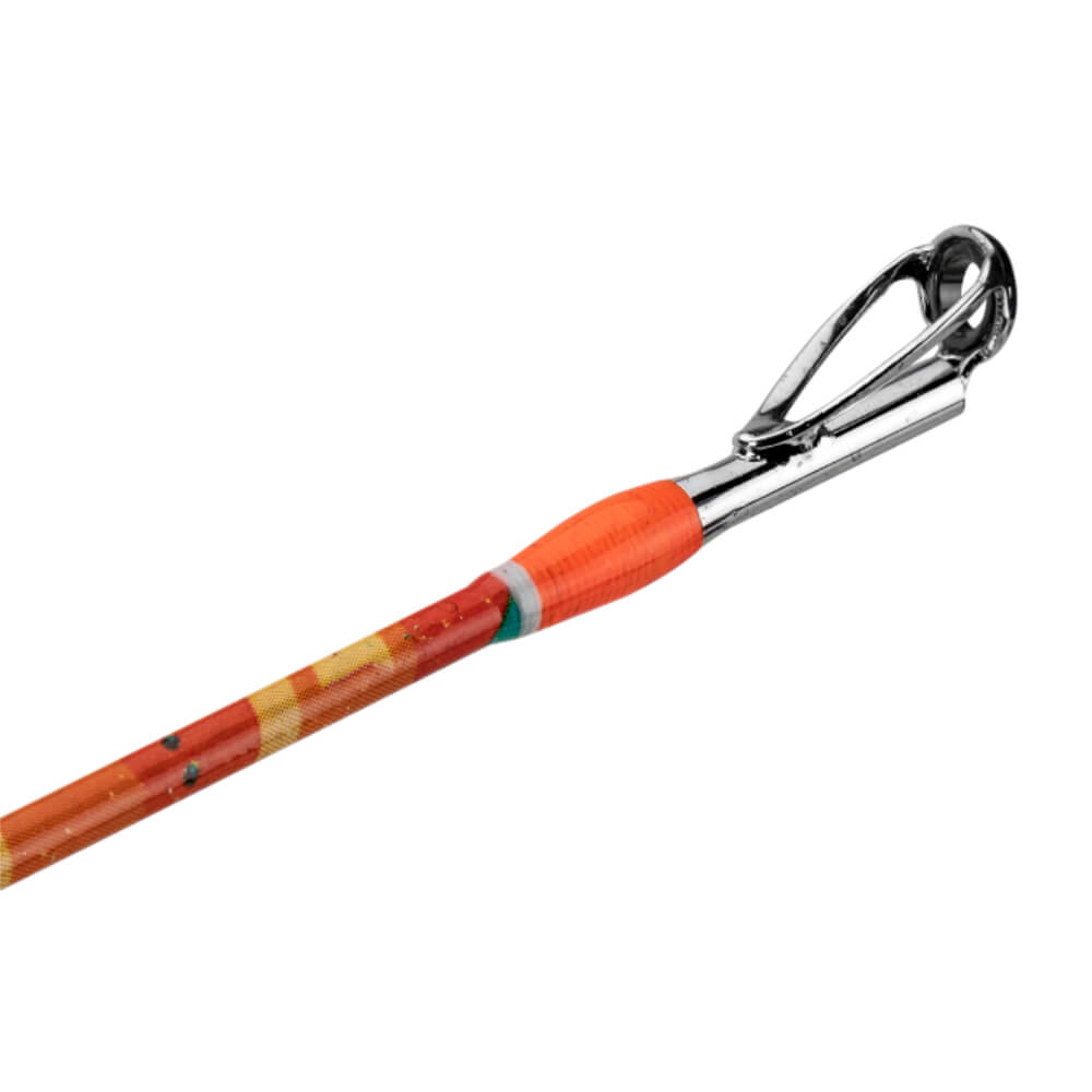 Spincast rod tip with chrome line guide and orange-wrapped ferrule