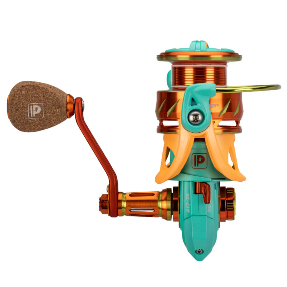Profishiency A12-3K Krazy spinning reel, teal and orange body with cork handle knob and 'P' logo