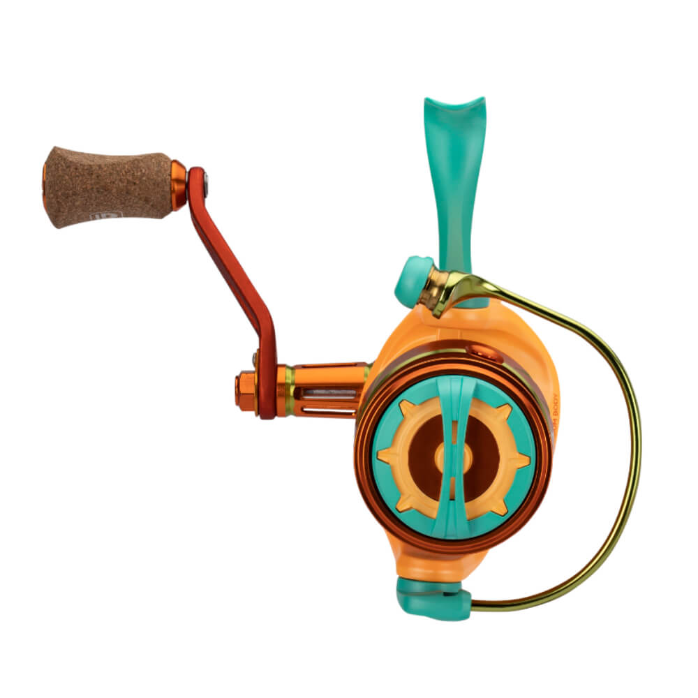 Krazy spinning fishing reel, front view, orange body with teal spool and bail and cork-handled crank