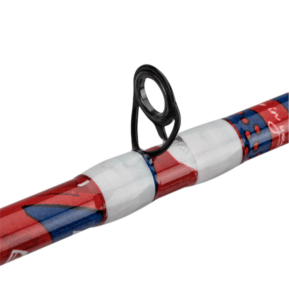 Close-up of baitcast rod guide with red, white and blue Americana wrap