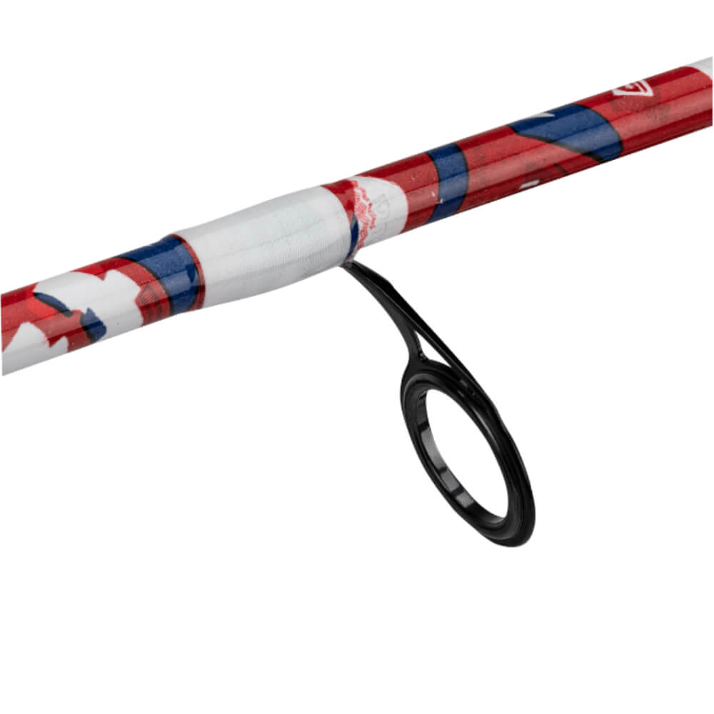 Close-up of a fishing rod guide on a red, white and blue wrapped rod blank