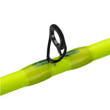 Close up of Profishiency Next Gen Flash baitcast rod guide showcasing black ceramic lined guide and neon chartreuse rod blank on white background