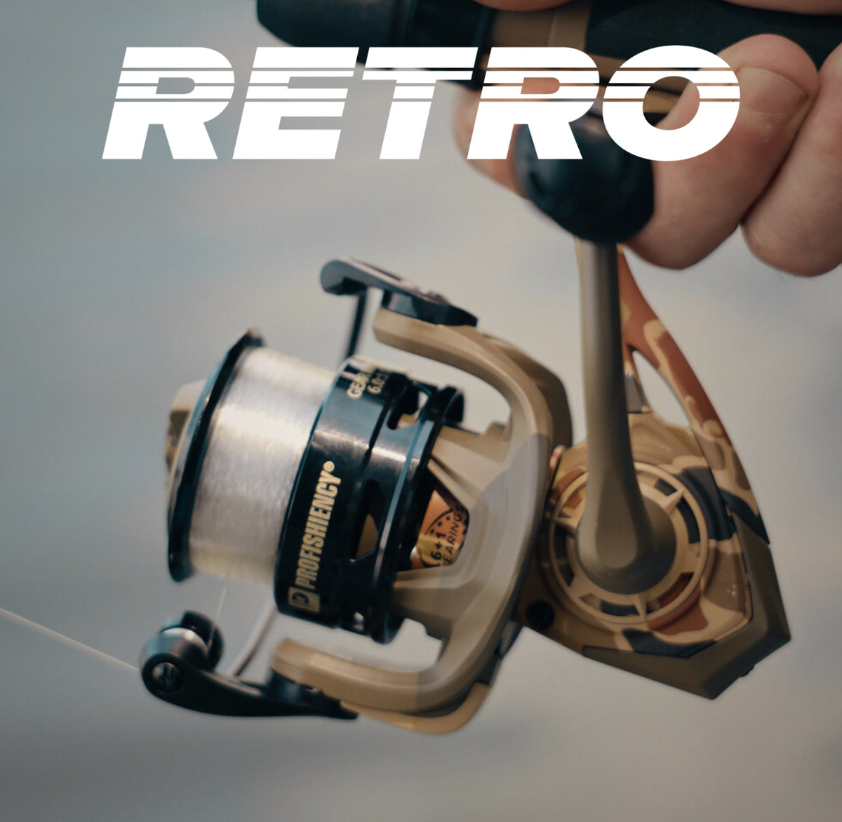 Close-up of Retro Spinning Reels - Clam Pack showcasing a spinning reel and RETRO text with a fishing rod background
