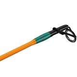 Orange fishing rod tip with green thread wrap and black tip-top guide with metal ring