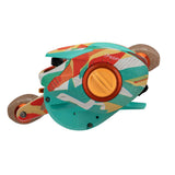 Colorful baitcasting reel (palm-side) with orange dial, cork handle and PROFI text on side