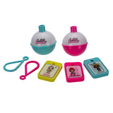 Two LOL surprise balls (teal and pink) with three character key tags and two plastic clips