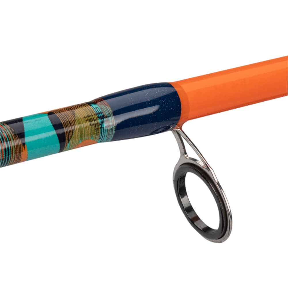 Fishing rod close-up showing chrome guide ring and orange, navy and teal thread wrap on the blank