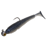 Gray-blue ribbed soft swimbait with paddle tail, mounted on a jighead with yellow eye and an exposed hook.