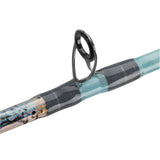 Spinning rod guide with teal and holographic wrapped blank, close-up of guide foot and thread wraps
