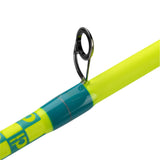 Neon hi‑vis yellow fishing rod guide with teal thread wrap and black metal guide ring, close-up
