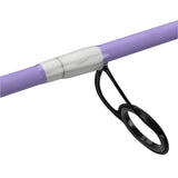 Purple fishing rod mid-section showing silver thread wrap and black oval line guide
