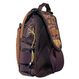 Side view of Profishiency Retro Sling Bag showing camo front flap, MOLLE webbing, mesh padded back, and adjustable crossbody strap