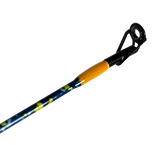 Close up of Profishiency DRIP baitcast rod tip showing aluminum oxide guide and orange handle wrap on black background