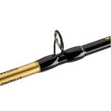 Close-up of Profishiency Sniper spincast rod showing guide and black-and-gold blank on white background