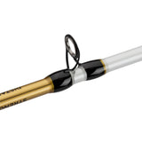 Close-up of white fishing rod guide with black wraps and gold blank showing text 'DISTA' 'STREN'.