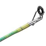 Green fishing rod tip with chrome line guide and reinforced tip wrap