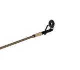 Close-up of Retro Dock Combo rod tip showcasing top guide ring and beige thread wrap on a black background