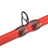 Close-up of Profishiency Sniper red spincast rod showcasing single tip guide with red thread wraps on white background
