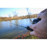 Close-up of True Timber Strata Dock Combo rod and baitcasting reel showing foam handle with pond background