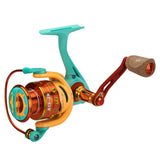 Angled view of Profishiency A13 Krazy spinning reel with turquoise and orange spool and cork handle on white background