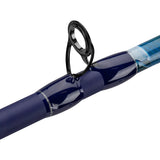 Close-up of Krazy Kool casting rod guide showing black stainless steel guide and glossy blue wrapped blank on white background